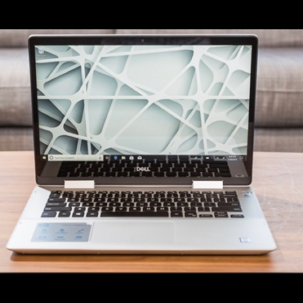 Touch screen gray foldable Dell laptop